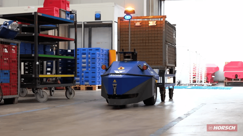 Video: INDUROS towing transport trolleys through the production hall at HORSCH